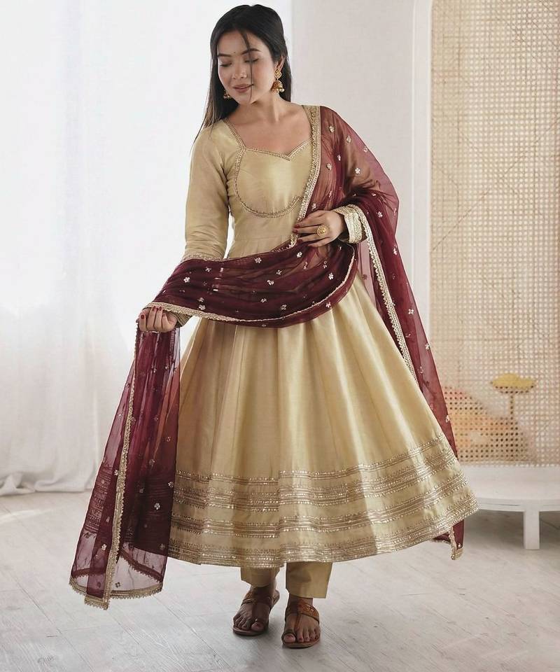 Cream silk blend anarkali with maroon contrast dupatta