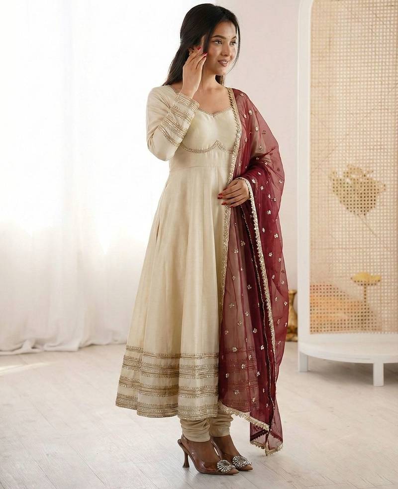 Cream silk blend anarkali with maroon contrast dupatta