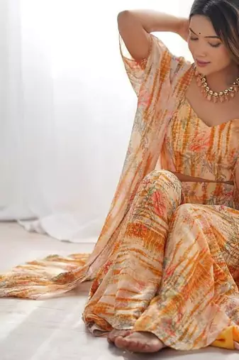 Light yellow color flower printed faux georgette stitched shrug  blouse palazzo set