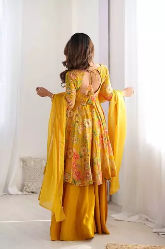 Yellow color romansilk blend chanderi discharge print kediya style top plazzo dupatta.
