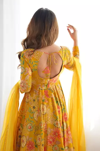Yellow color romansilk blend chanderi discharge print kediya style top plazzo dupatta.