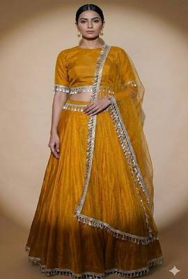mustard yellow art silk lehenga set with tassel border dupatta 1