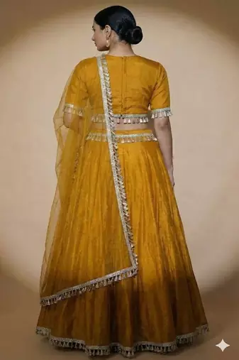 mustard yellow art silk lehenga set with tassel border dupatta