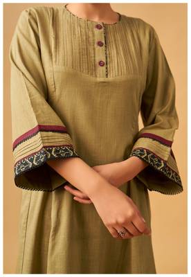 Classic mustard cotton kurta set with printed bottoms 3