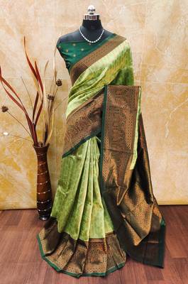 pista green silk blend banarasi saree with unstitched blouse piece 1