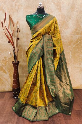 Yellow green soft silk blend banarasi jacuard work designer party wear saree with unstitched blouse piece