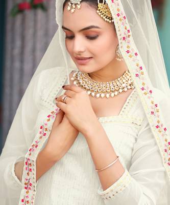  cream ethnic dress material set featuring delicate floral embroidery with skirt & dupatta 3