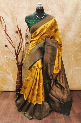yellow silk blend banarasi saree with unstitched blouse piece 1