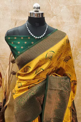 yellow silk blend banarasi saree with unstitched blouse piece