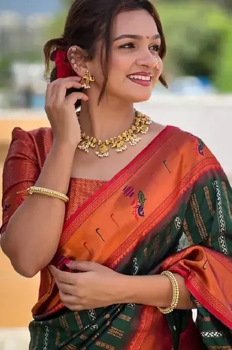 green orange silk blend banarasi saree with unstitched blouse piece