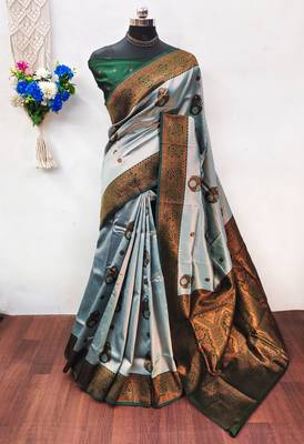 sea green silk blend banarasi saree with unstitched blouse piece 1