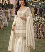 Elegant cream embroidered real silk kurta sharara set with dupatta