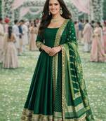 Elegant emerald green silk embroidered anarkali gown with dupatta