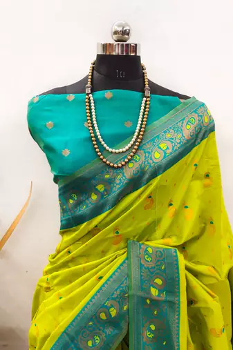 lemon rama silk blend banarasi saree with unstitched blouse piece