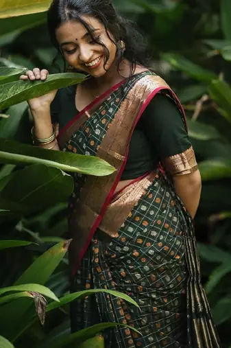 green silk blend banarasi saree with unstitched blouse piece