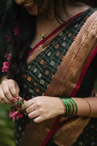 green silk blend banarasi saree with unstitched blouse piece
