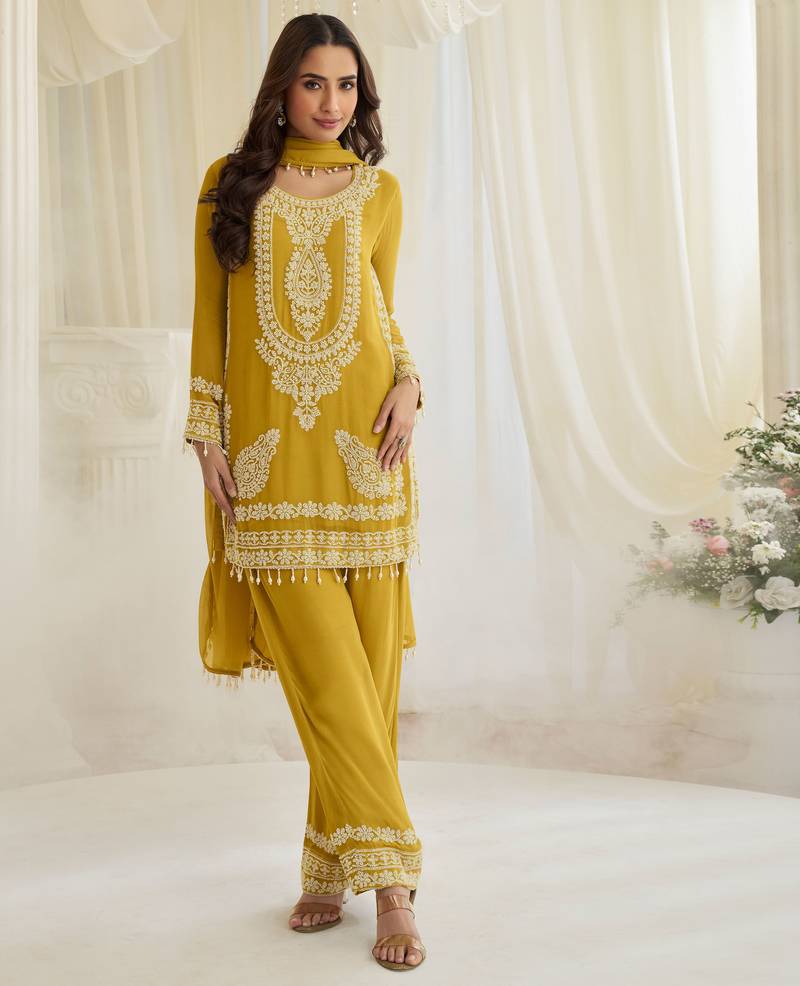 Yellow georgette sequins readymade suits free size up to 42
