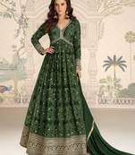 Dark green art silk sequins readymade suits free size up to 42