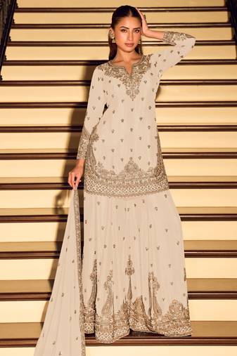 Cream art silk sequins readymade suits free size up to 42