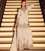 Cream art silk sequins readymade suits free size up to 42