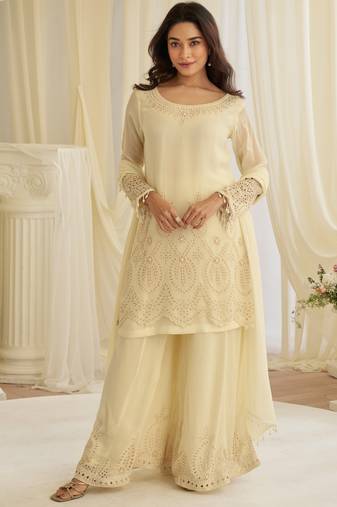 Beige crepe sequins readymade suits free size up to 42