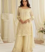Beige crepe sequins readymade suits free size up to 42