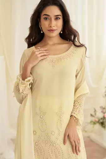 Beige crepe sequins readymade suits free size up to 42