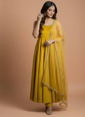 Yellow embroidered pure silk salwar suit 1