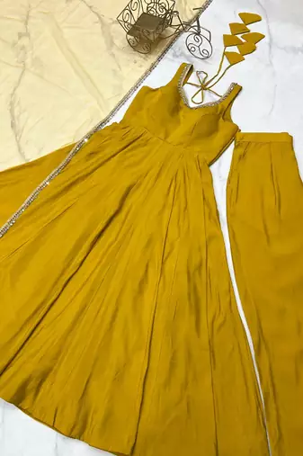 Yellow embroidered pure silk salwar suit