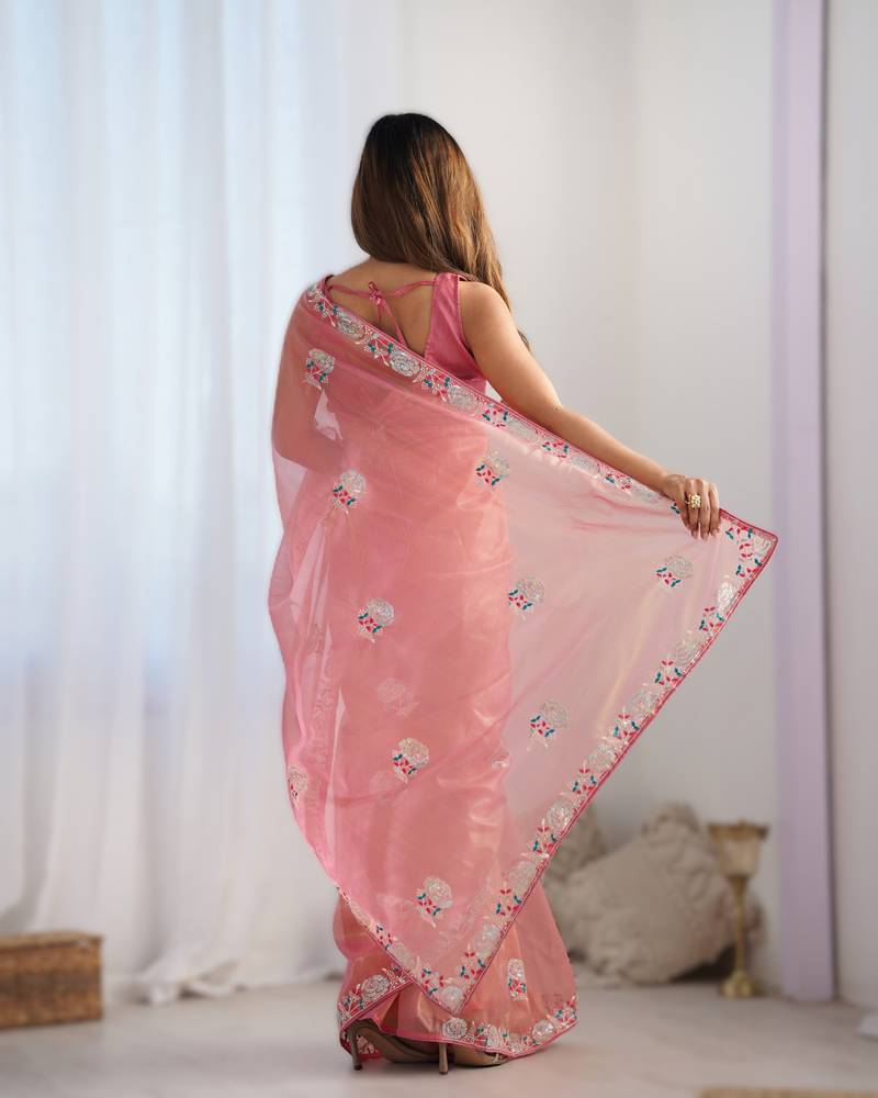 Pink dual tone heavy gold twills net saree with multicolor thread & sequin work