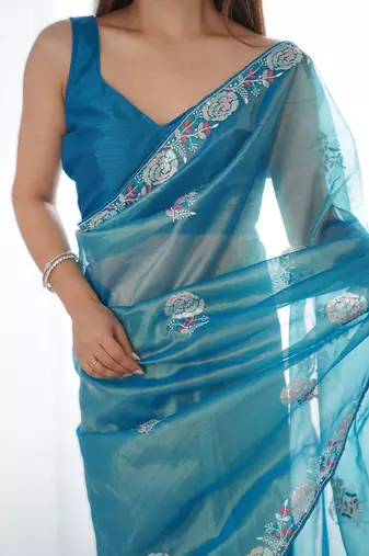 Royal blue dual tone gold twills net saree with multicolor thread & sequin work