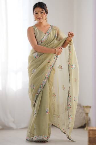 Parrot green dual tone heavy gold twills net saree with multicolor thread & sequin work
