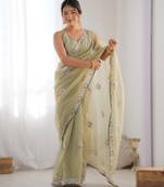 Parrot green dual tone heavy gold twills net saree with multicolor thread & sequin work