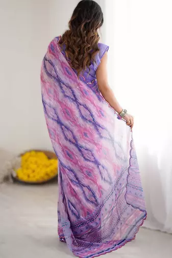 Light purple georgette printed saree with mirror work border & unstitched georgette silk blend blouse