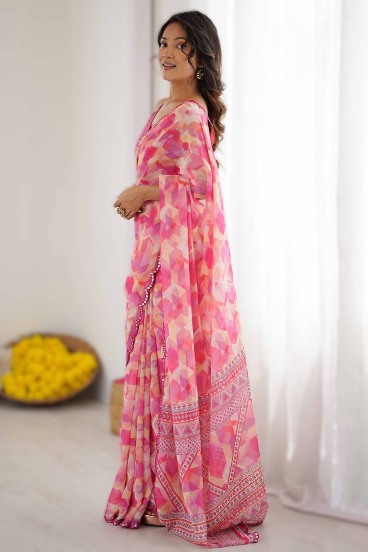 Baby pink heavy georgette printed saree with mirror work border & unstitched georgette silk blouse