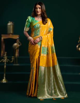 yellow soft art silk blend saree with fancy pumpum border 1