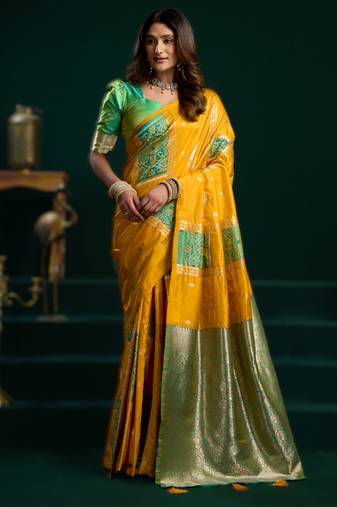 yellow soft art silk saree with fancy pumpum border