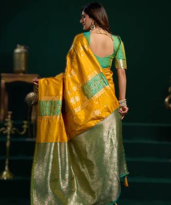 yellow soft art silk blend saree with fancy pumpum border 2