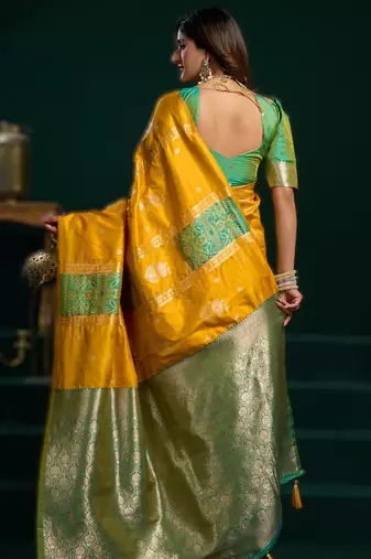 yellow soft art silk blend saree with fancy pumpum border