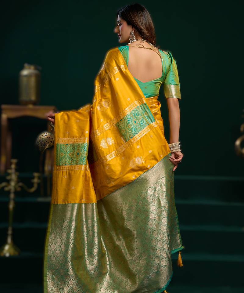 yellow soft art silk saree with fancy pumpum border