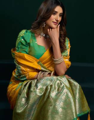 yellow soft art silk blend saree with fancy pumpum border 3