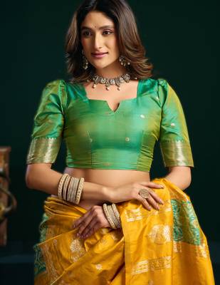 yellow soft art silk blend saree with fancy pumpum border 4