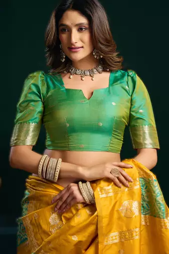 yellow soft art silk blend saree with fancy pumpum border