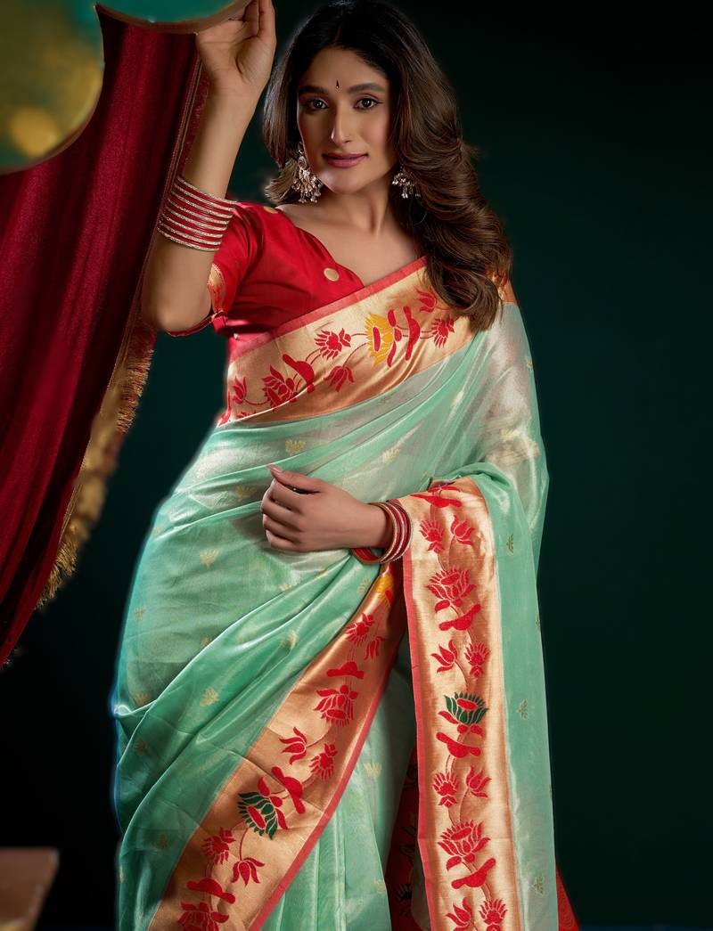 sea green premium tissue paithani saree with lotus zari border & pum pum