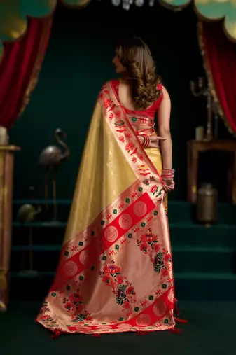 yellow premium tissue paithani saree with lotus zari border & pum pum
