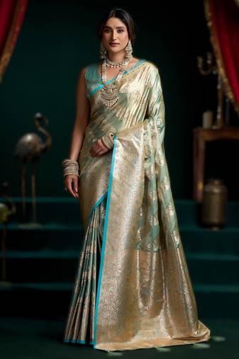 Sky blue premium satin silk saree with stylish pom-pom pallu