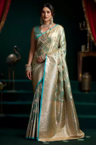 Sky blue premium satin silk saree with stylish pom-pom pallu