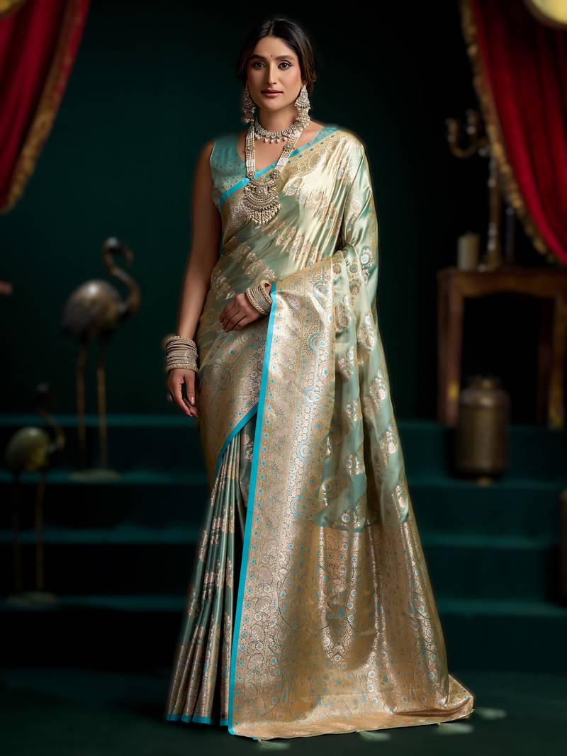 Sky blue premium satin silk saree with stylish pom-pom pallu