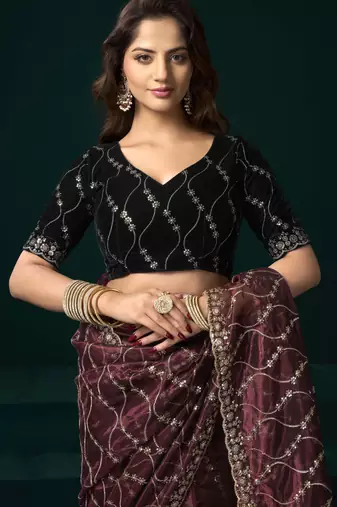 maroon net saree with embroidered pallu work