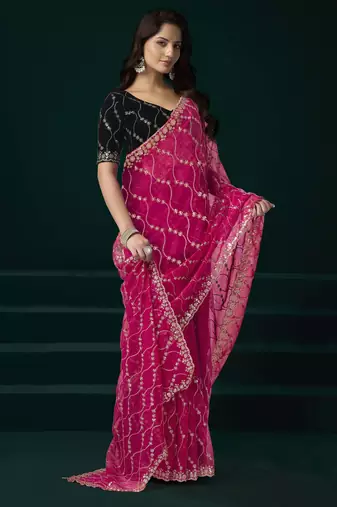 pink net saree with embroidered pallu work